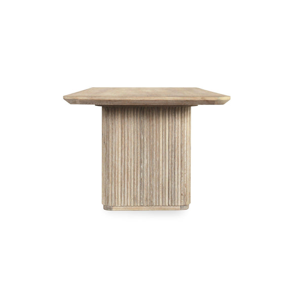 Wood dining table with column-style ribbed leg, cream-washed finish, 84 in.
