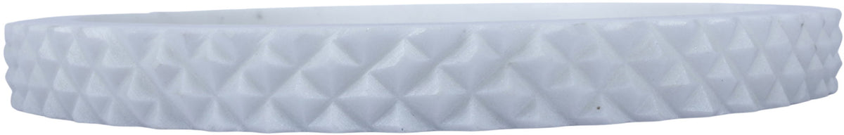 White marble tray side view with textured diamond rim detail.