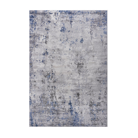 Rectangular abstract area rug, silver-gray with blue distressed blotches and speckles