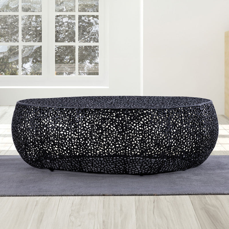 Oval coffee table in black with speckled lattice metal texture and slightly raised rim