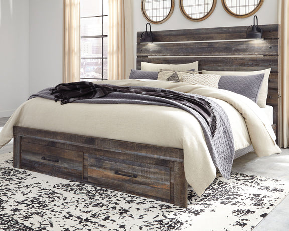 Drystan panel bed with dark wood frame and slatted headboard, dressed in neutral bedding