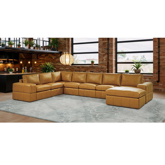 Light brown modular sectional sofa with chaise and square arms in open living space