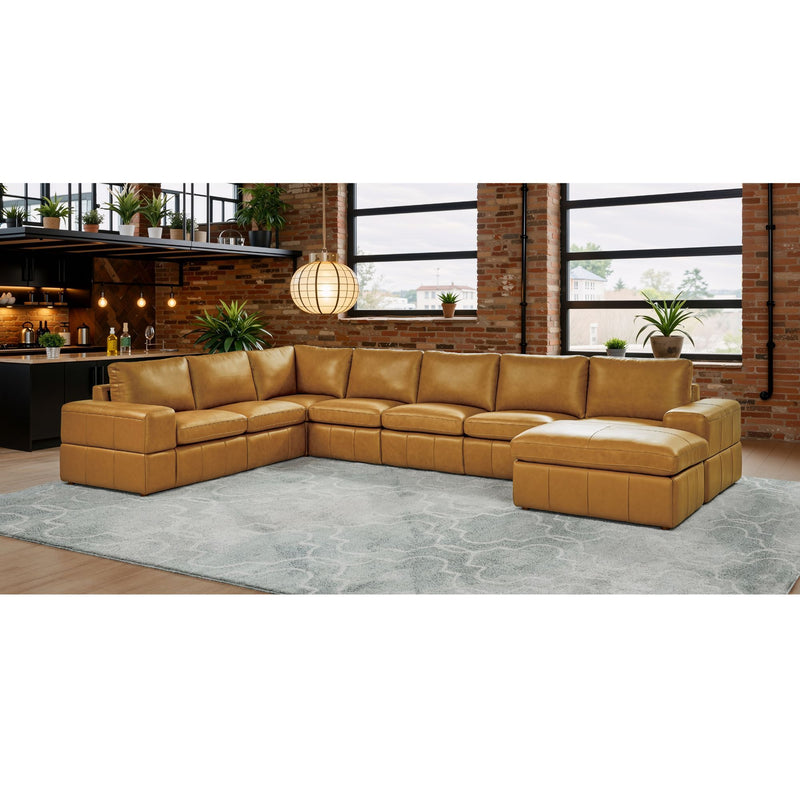 Light brown modular sectional sofa with chaise and square arms in open living space
