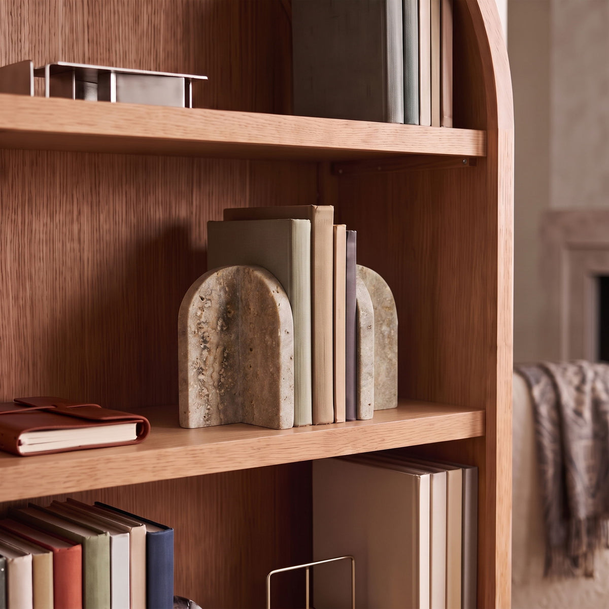 Beige marble bookends with speckled finish and arched shape, set of 2