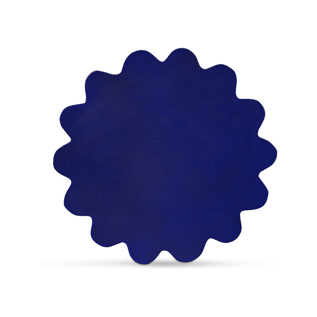 Blue accent table with scalloped circular top, starburst silhouette