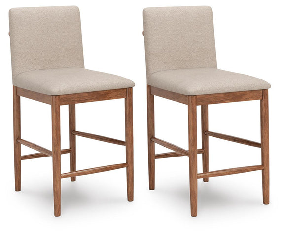 Pair of upholstered barstools with beige fabric seats and tall backs, light brown wooden frames