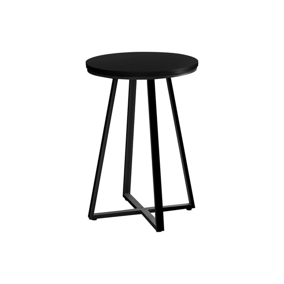 Black round accent side table with flat circular top and tapered four-leg frame