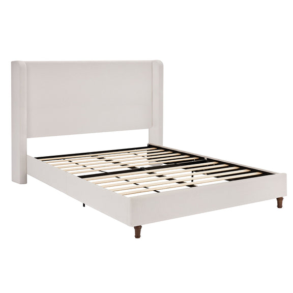 White upholstered bed frame with tall headboard and black-and-white slatted base