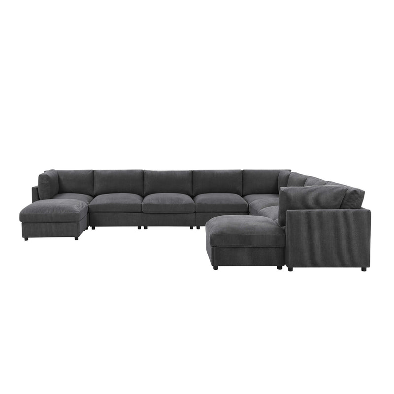 Dark gray sectional sofa with chaise ottoman and boxed back cushions