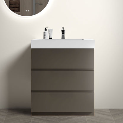 Bathroom vanity with white countertop, three drawers, and built-in sink in gray cabinet finish.