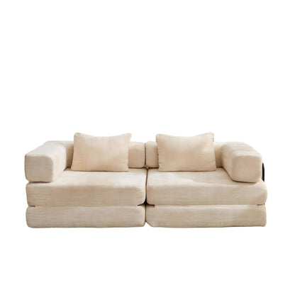 Beige convertible floor sofa bed with two back pillows and padded square armrests