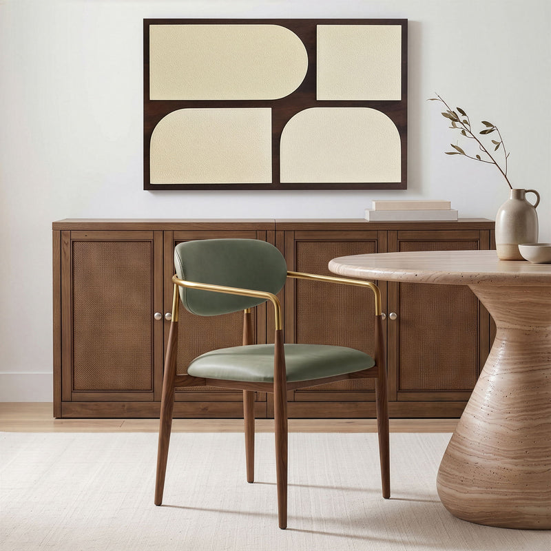 Green upholstered dining arm chair with gold frame and walnut legs