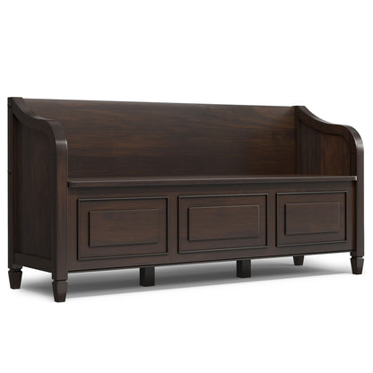 Dark brown storage bench with three drawer fronts and curved end panels