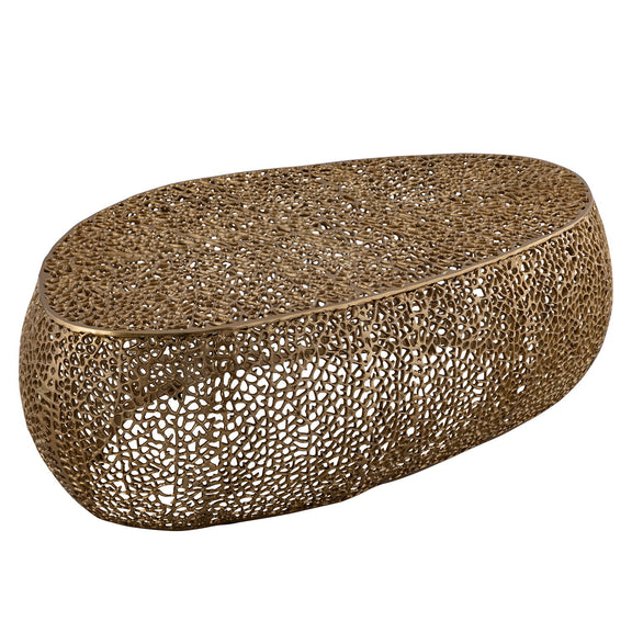 Oval coffee table in gold with speckled lattice metal texture and rounded edges