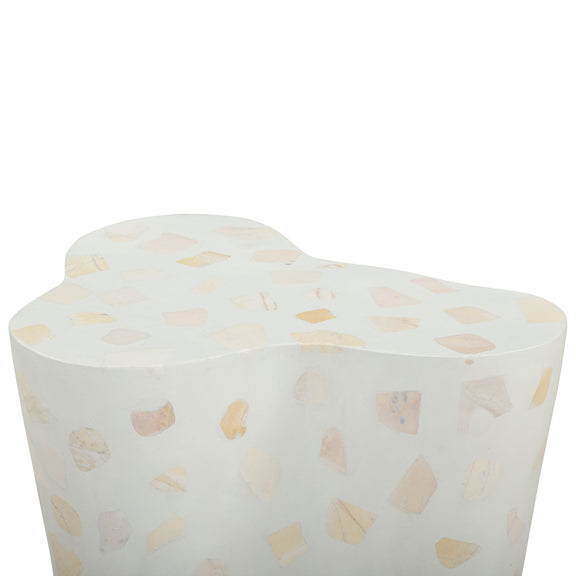 Light beige side table with terrazzo pattern top and smooth rounded corners