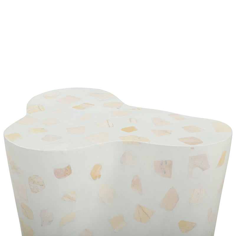 Light beige side table with terrazzo pattern top and smooth rounded corners