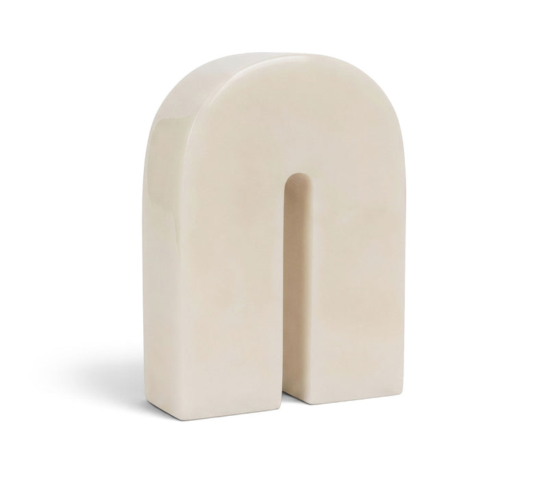 Ivory white marble bookend with arched cutout, smooth stone finish