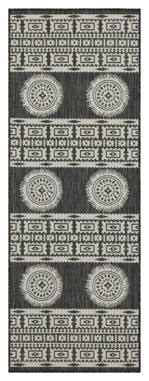 Polypropylene area rug with monochrome geometric border and circular medallion motifs