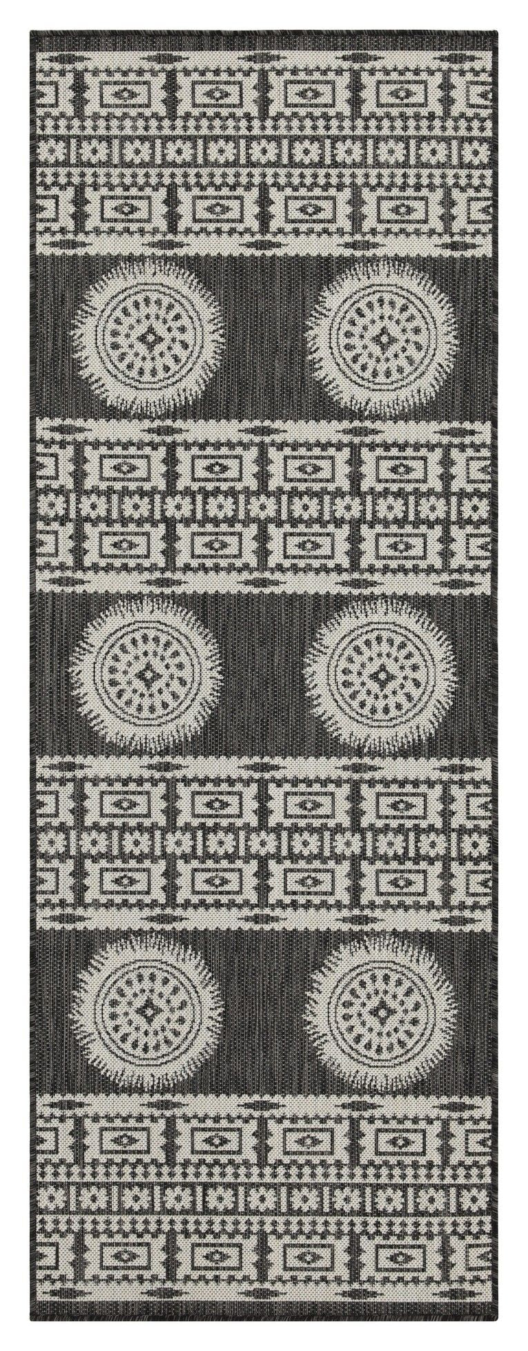 Polypropylene area rug with monochrome geometric border and circular medallion motifs