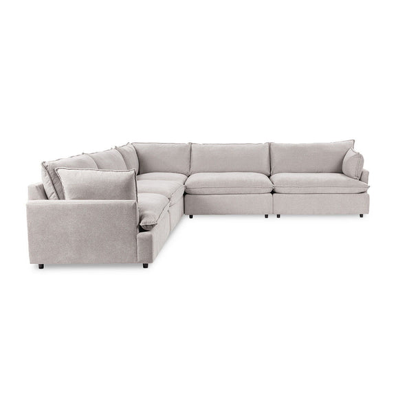 Modular sectional sofa in light gray with square arms and tufted seat cushions.