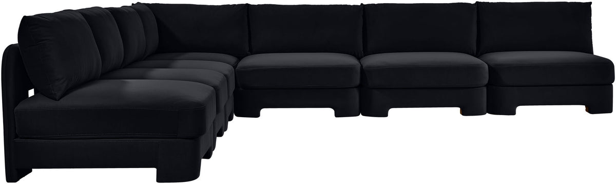Black armless velvet sectional sofa with chaise and ottoman-style seats