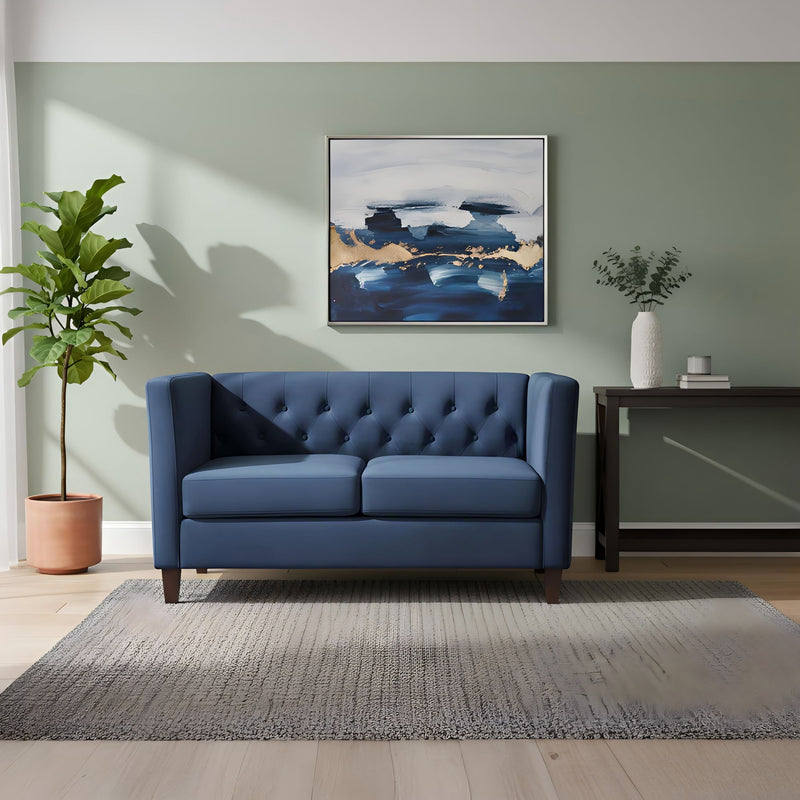 Blue button-tufted 2-seater loveseat with square arms and dark legs
