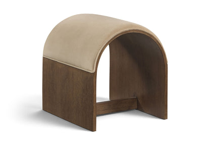 Beige velvet upholstered bench with arched back and dark wood base, open middle storage