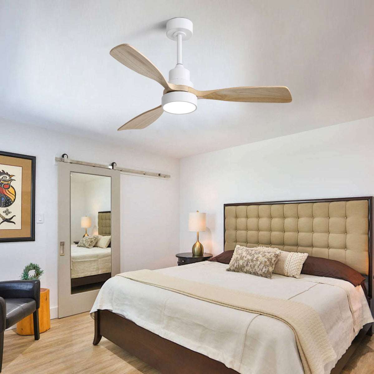 White indoor ceiling fan with four reversible wood blades and light fixture