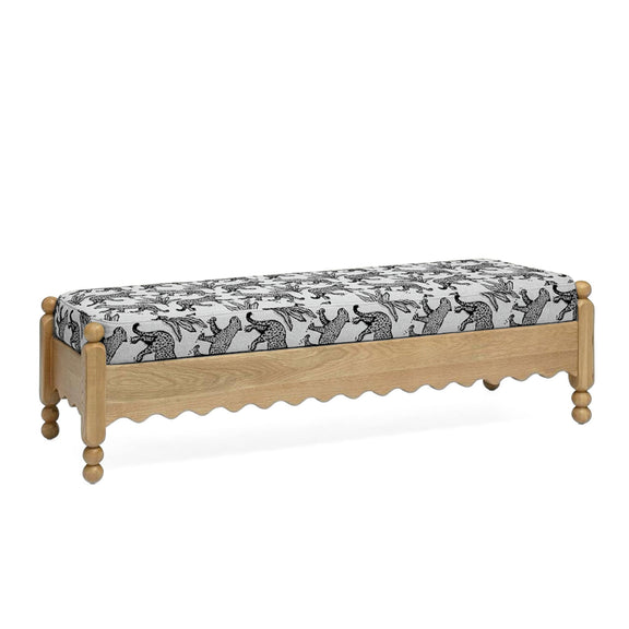 White leopard jacquard upholstered bench with scalloped front and wooden frame