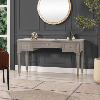Gray executive desk with three drawers and decorative brass knobs