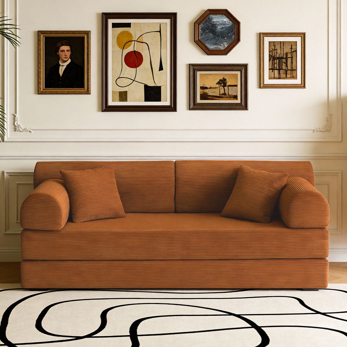 Orange convertible sleeper sofa bed in living room with three seat cushions.