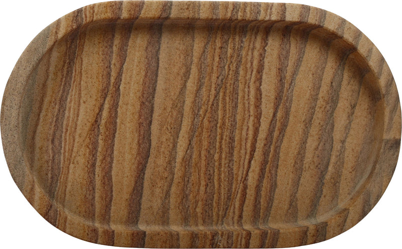 Oval top view of tan-brown sandstone tray with natural striped grain