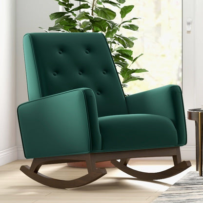 Tufted dark green rocking chair with padded arms and curved wooden rockers