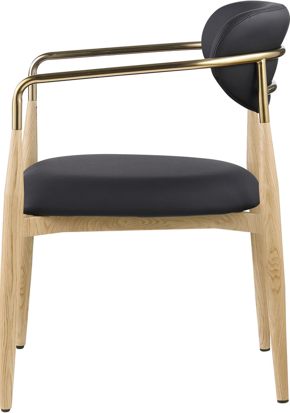 Dining arm chair with black upholstery seat and back, light wood legs, gold-tone arm frame