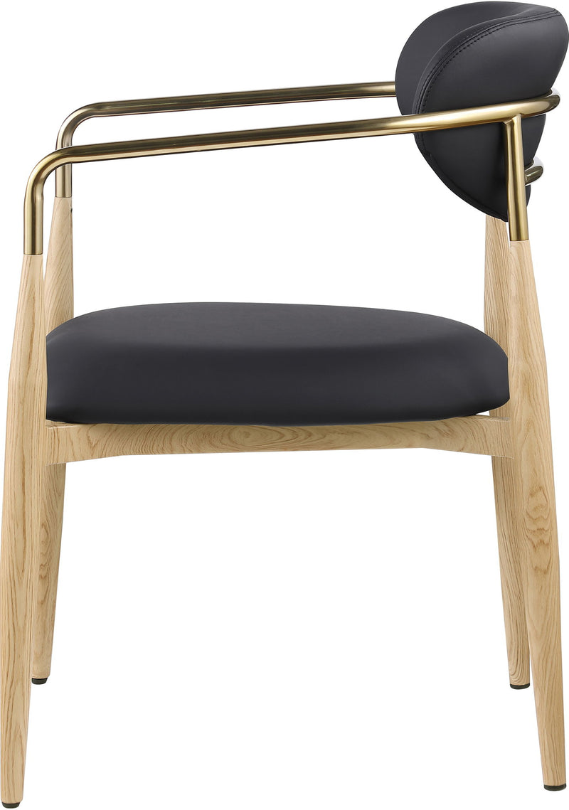 Dining arm chair with black upholstery seat and back, light wood legs, gold-tone arm frame