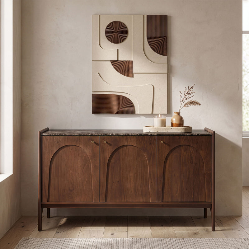 Marble-topped dark brown sideboard with three doors featuring arched carved panels