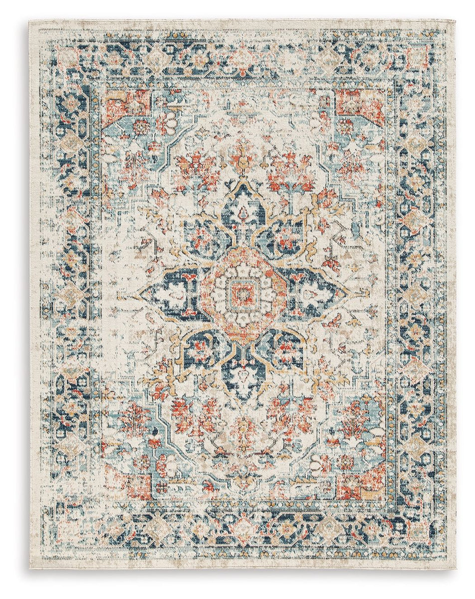 5 x 7 area rug with ornate multi-color distressed pattern and border