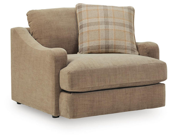 Chair and a half in tan upholstery with plaid back cushion