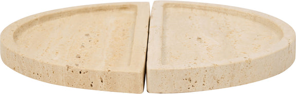 Beige travertine tray close-up with two semicircular halves separated by a seam.