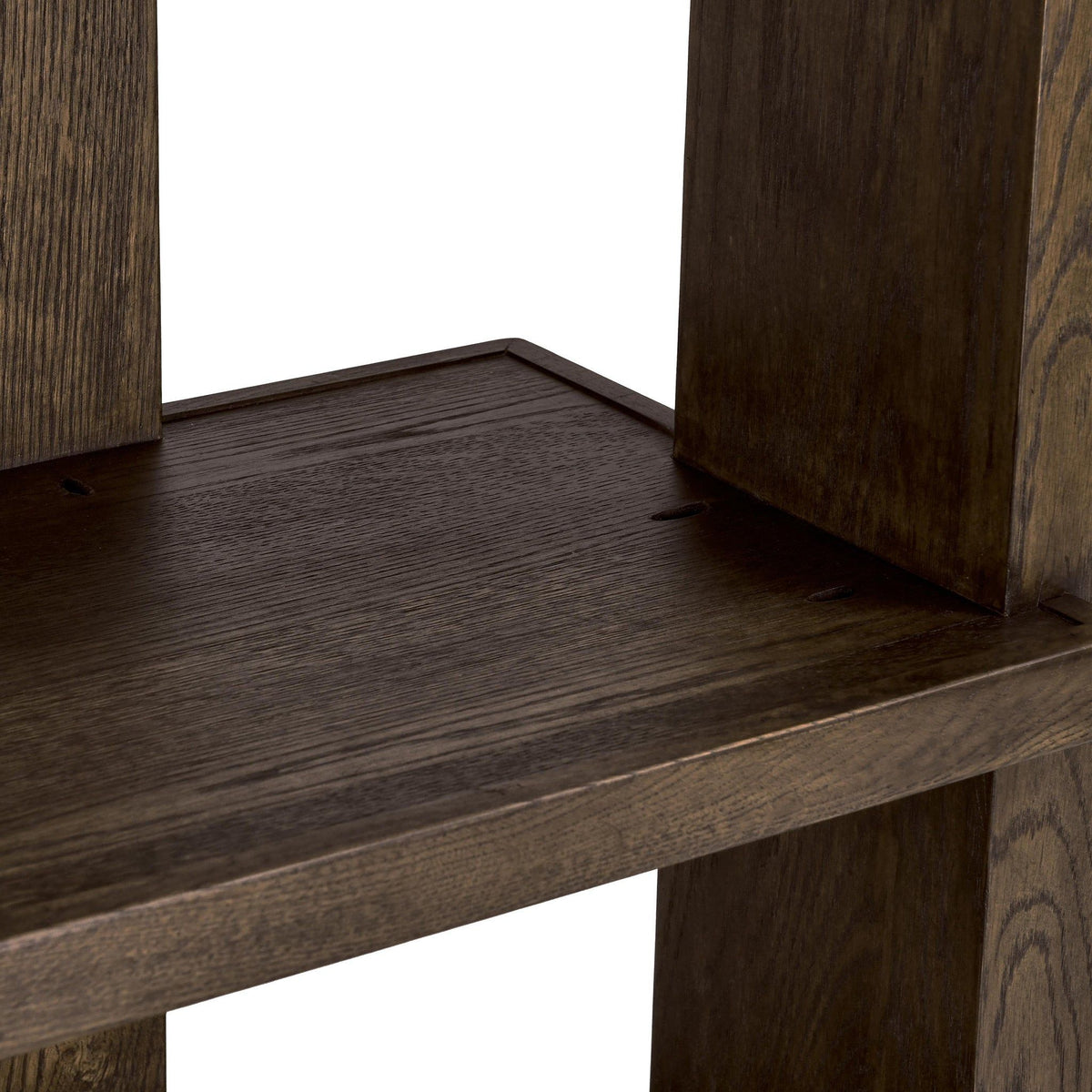 Dark brown bookcase corner shelf with stacked open cubby levels and wood grain