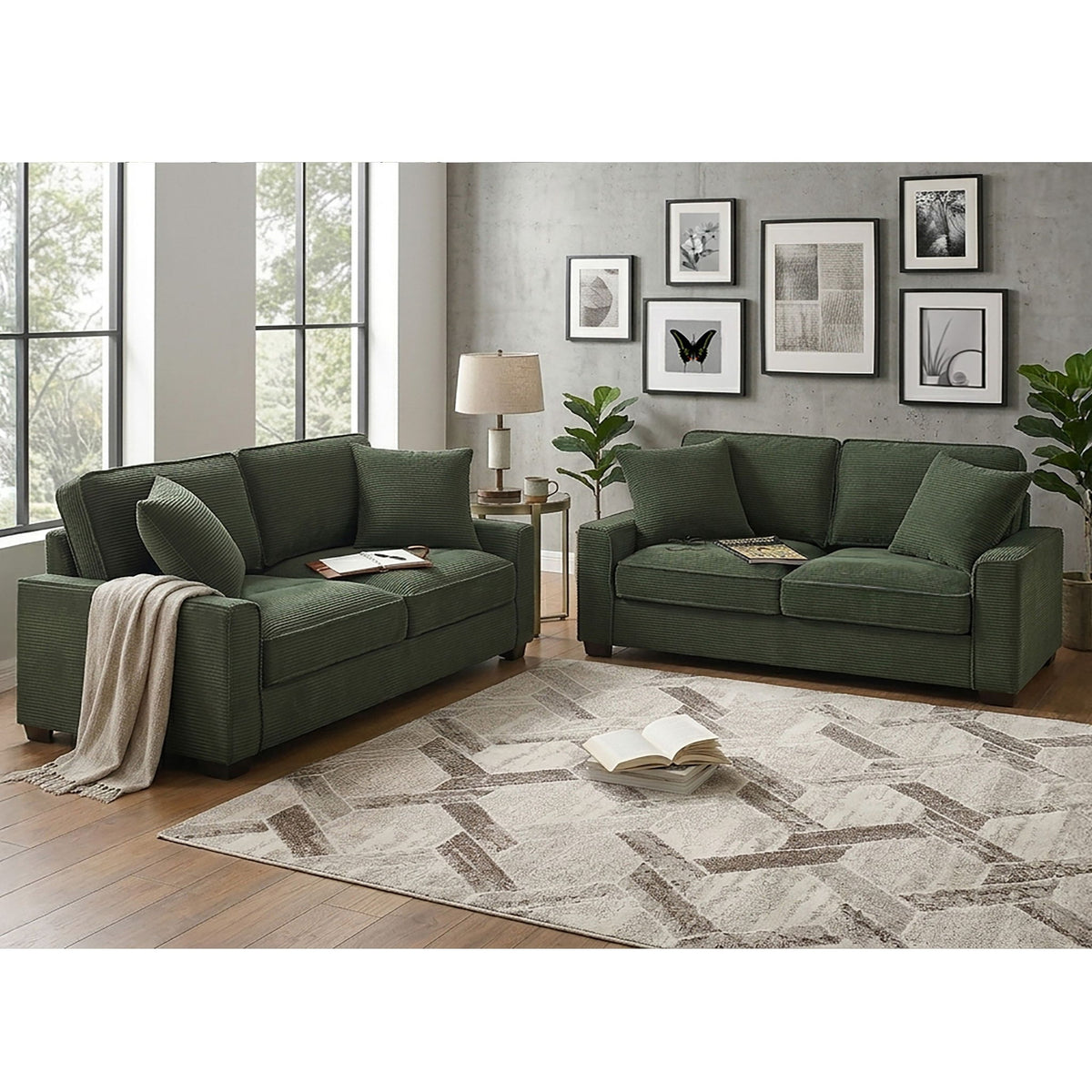 Forest green sofa and loveseat set with plush seat cushions and two accent pillows
