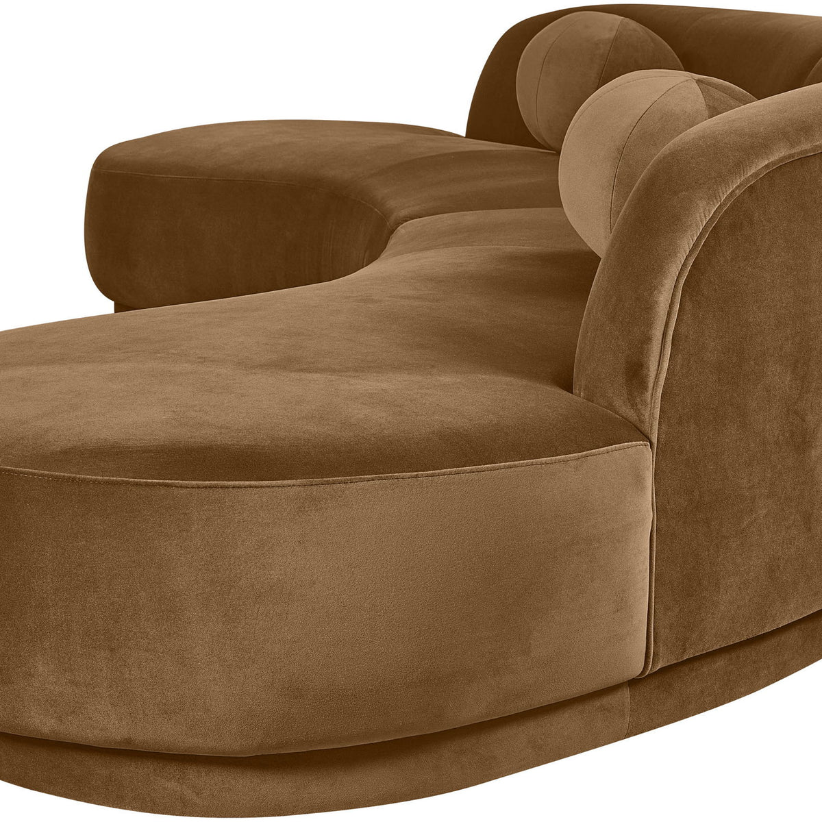 Light brown velvet accent sectional with deep seat and rounded arm detail