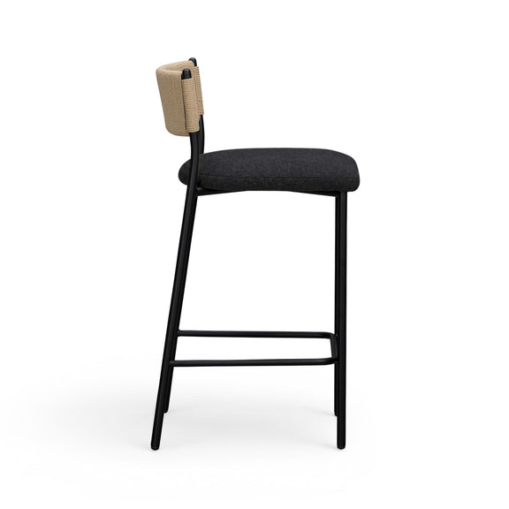 Celine boucle bar stool, side view: beige backrest, dark seat, black metal frame.