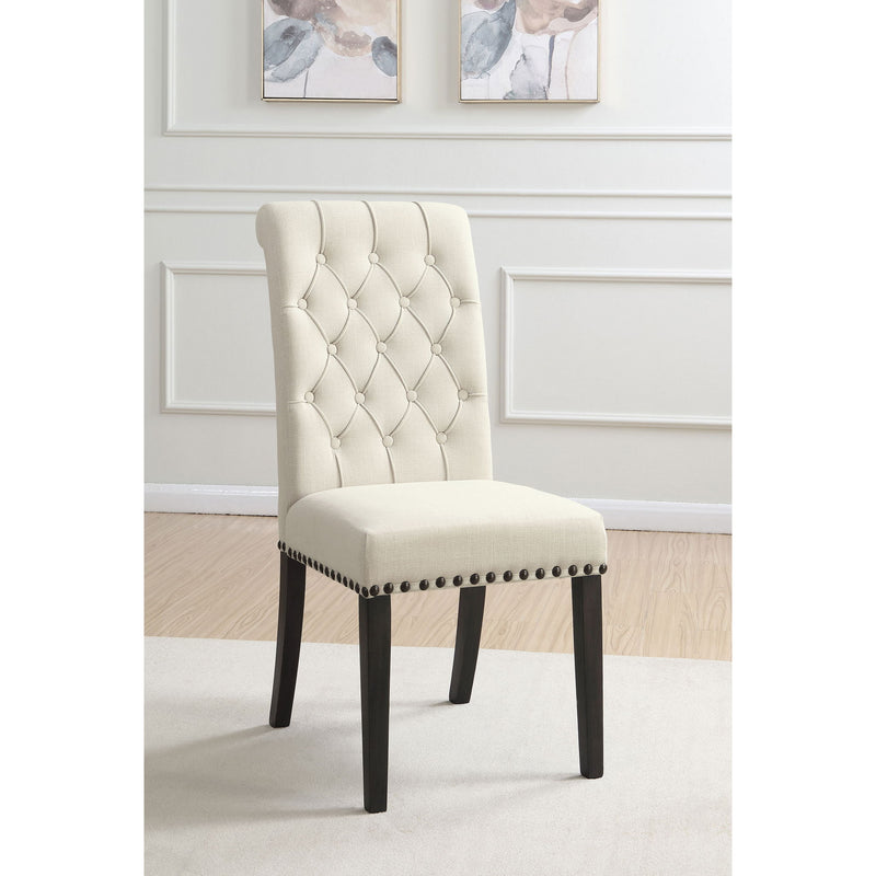 Beige tufted rolled backrest side chair with nailhead trim and dark wooden legs