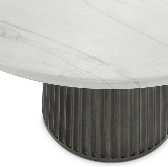 Outdoor round dining table, white marble-look top with dark ribbed base edge