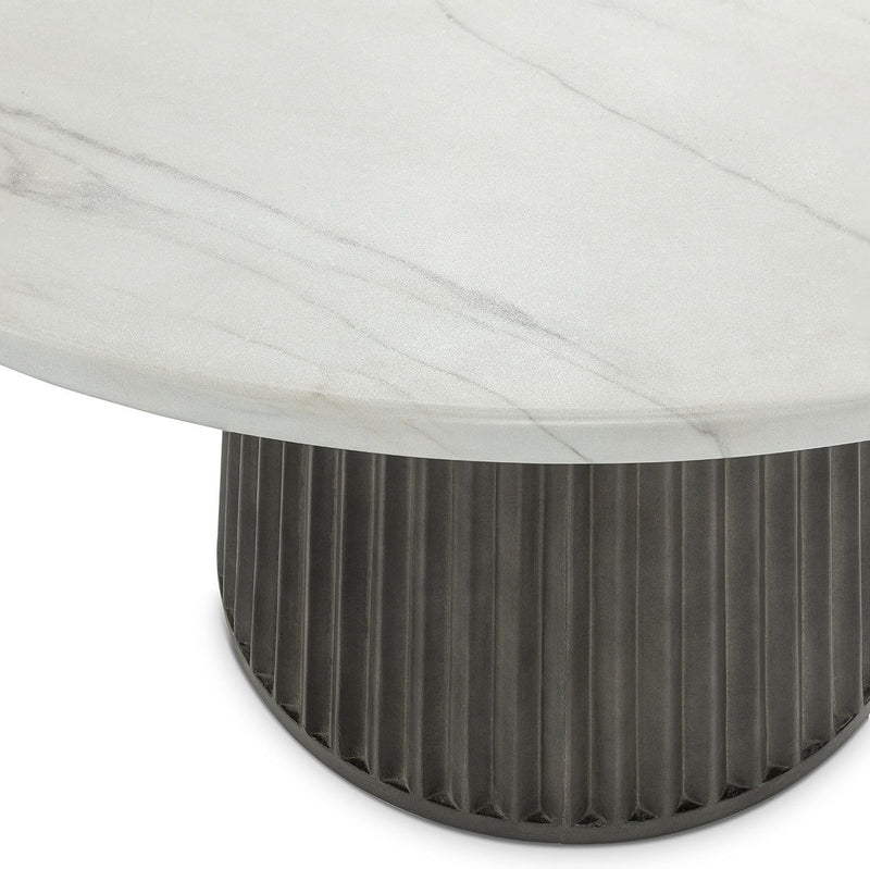 Outdoor round dining table, white marble-look top with dark ribbed base edge