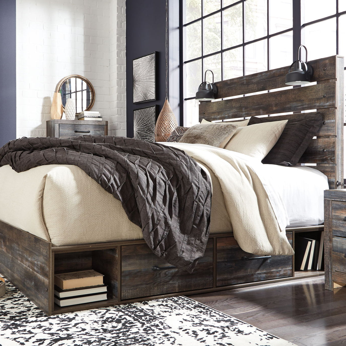 Drystan panel bed with dark wood frame, slatted headboard, and neutral throw pillows
