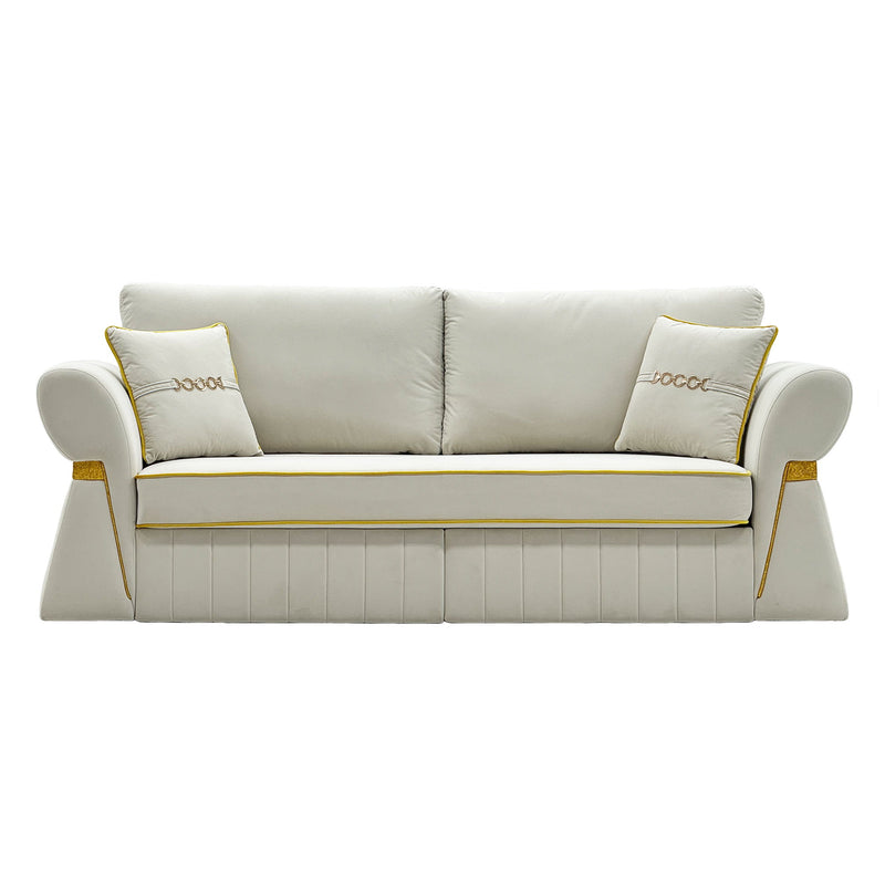 White three-seat sofa with two cushions and gold-tone piping