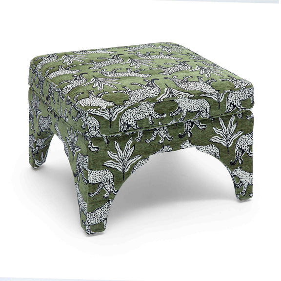 Upholstered ottoman in dark green with white jungle animal print, padded top, short legs