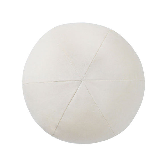 Round pillow in cream fabric with central star seam pattern.